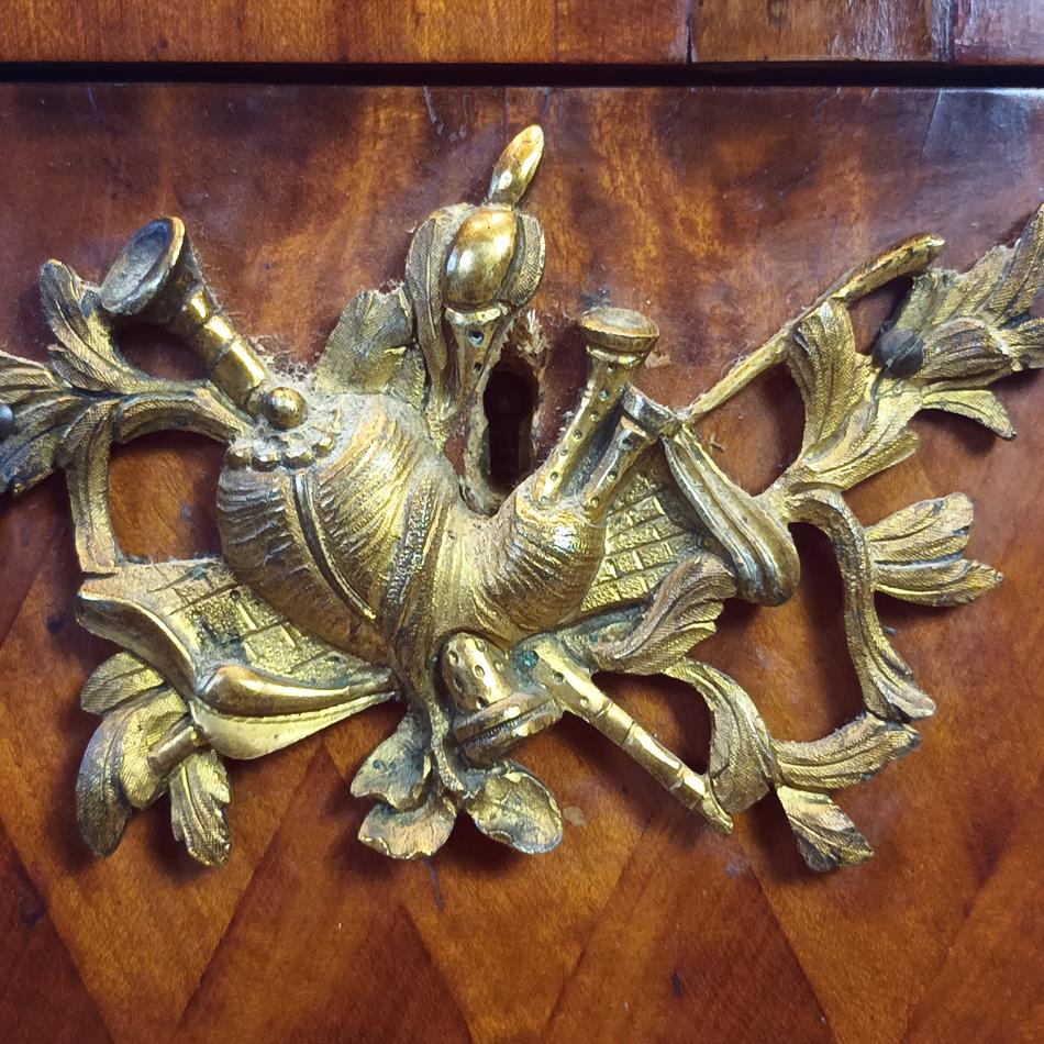 A Late 19th Century Serpentine Satinwood Commode
