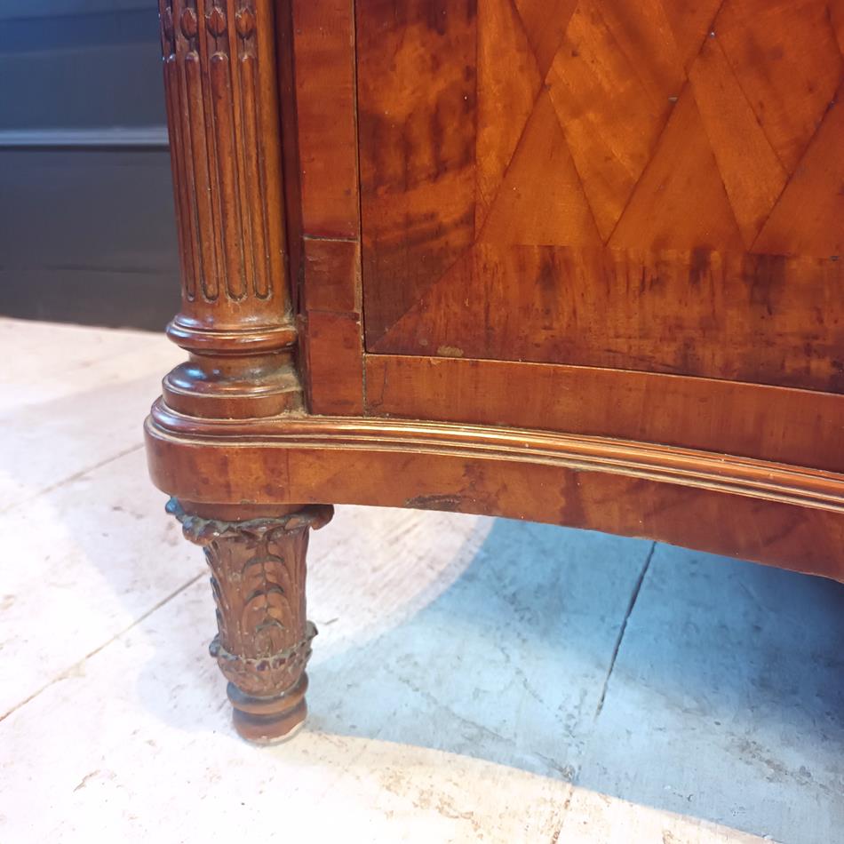 A Late 19th Century Serpentine Satinwood Commode