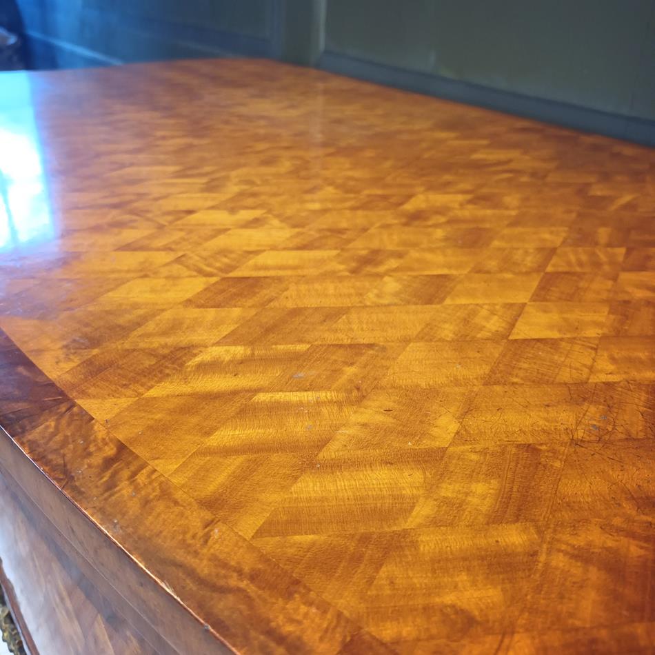 A Late 19th Century Serpentine Satinwood Commode