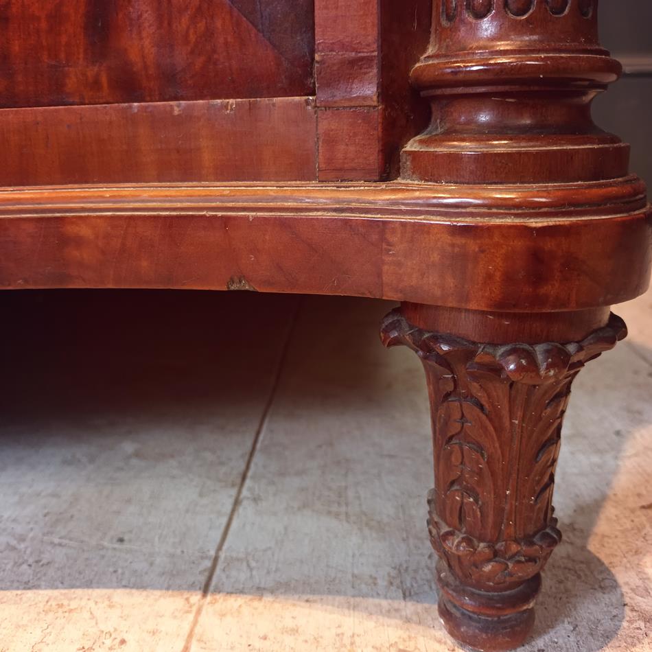A Late 19th Century Serpentine Satinwood Commode