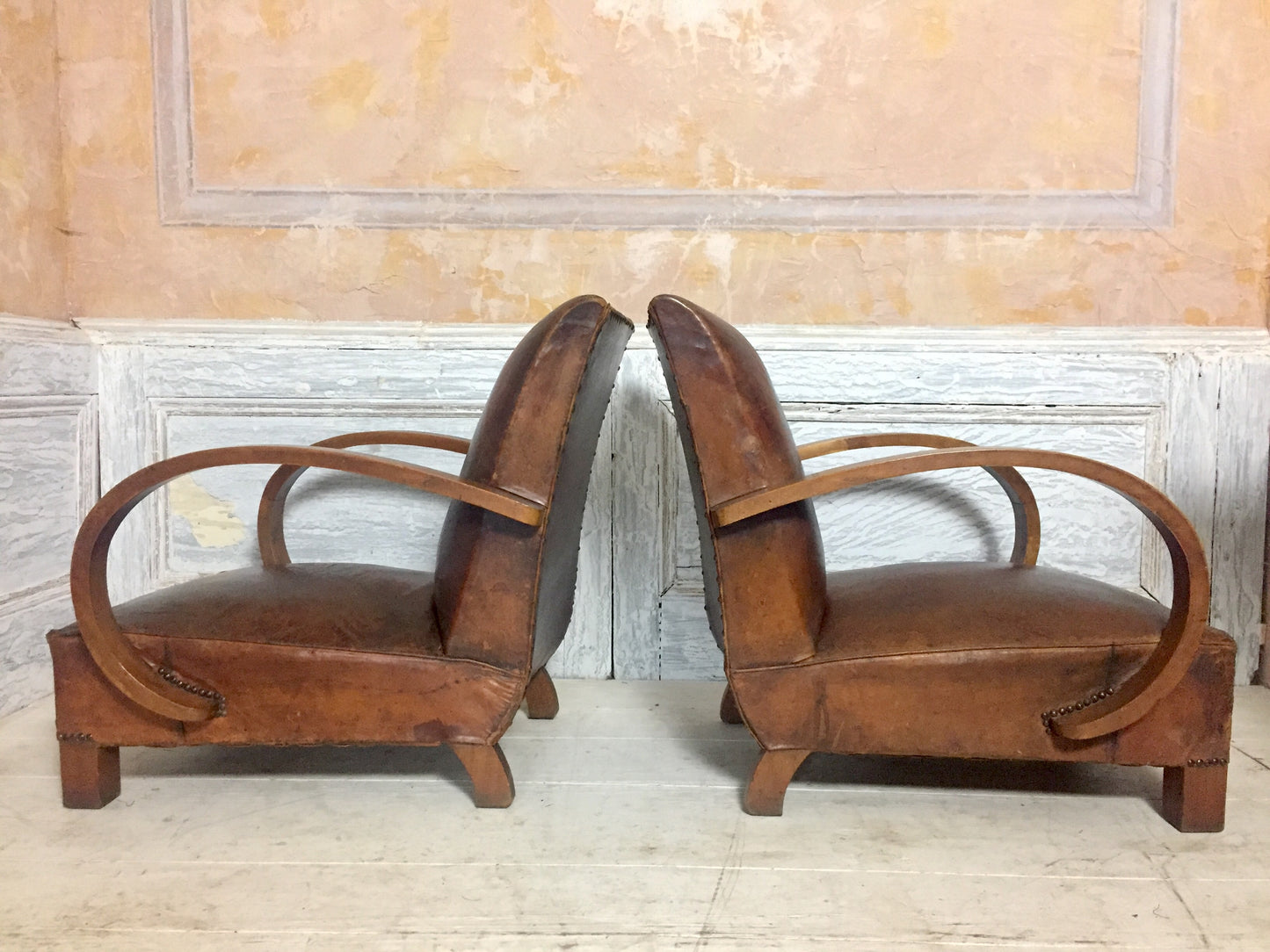 Pair Of Leather Arm Chairs