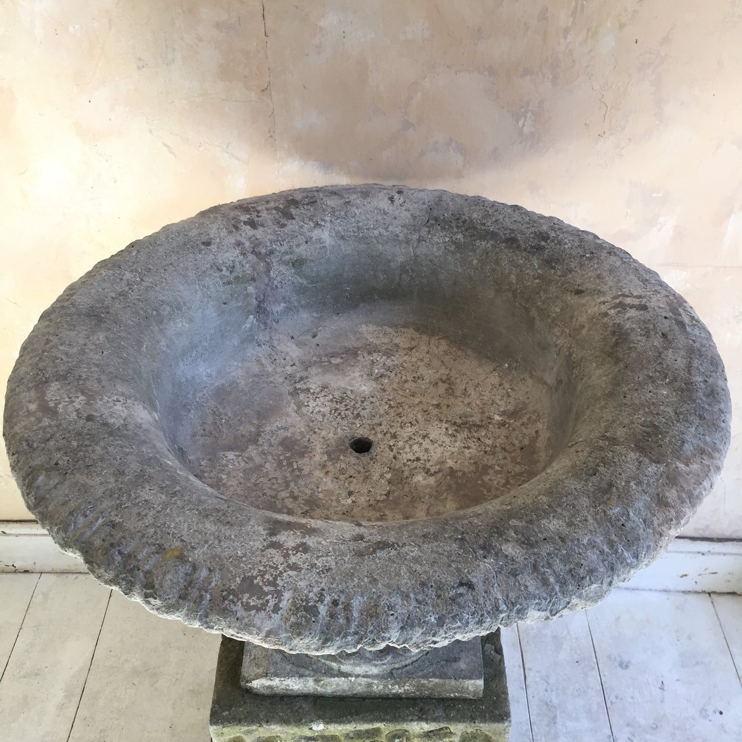 Urn On Rusticated Plinth
