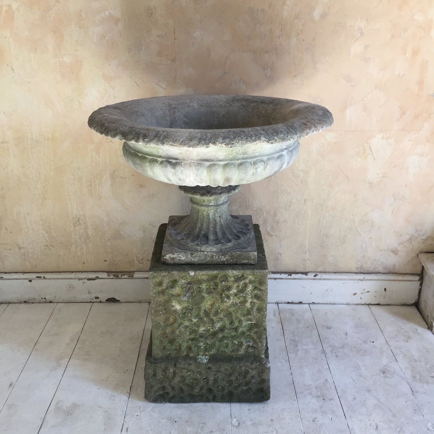 Urn On Rusticated Plinth