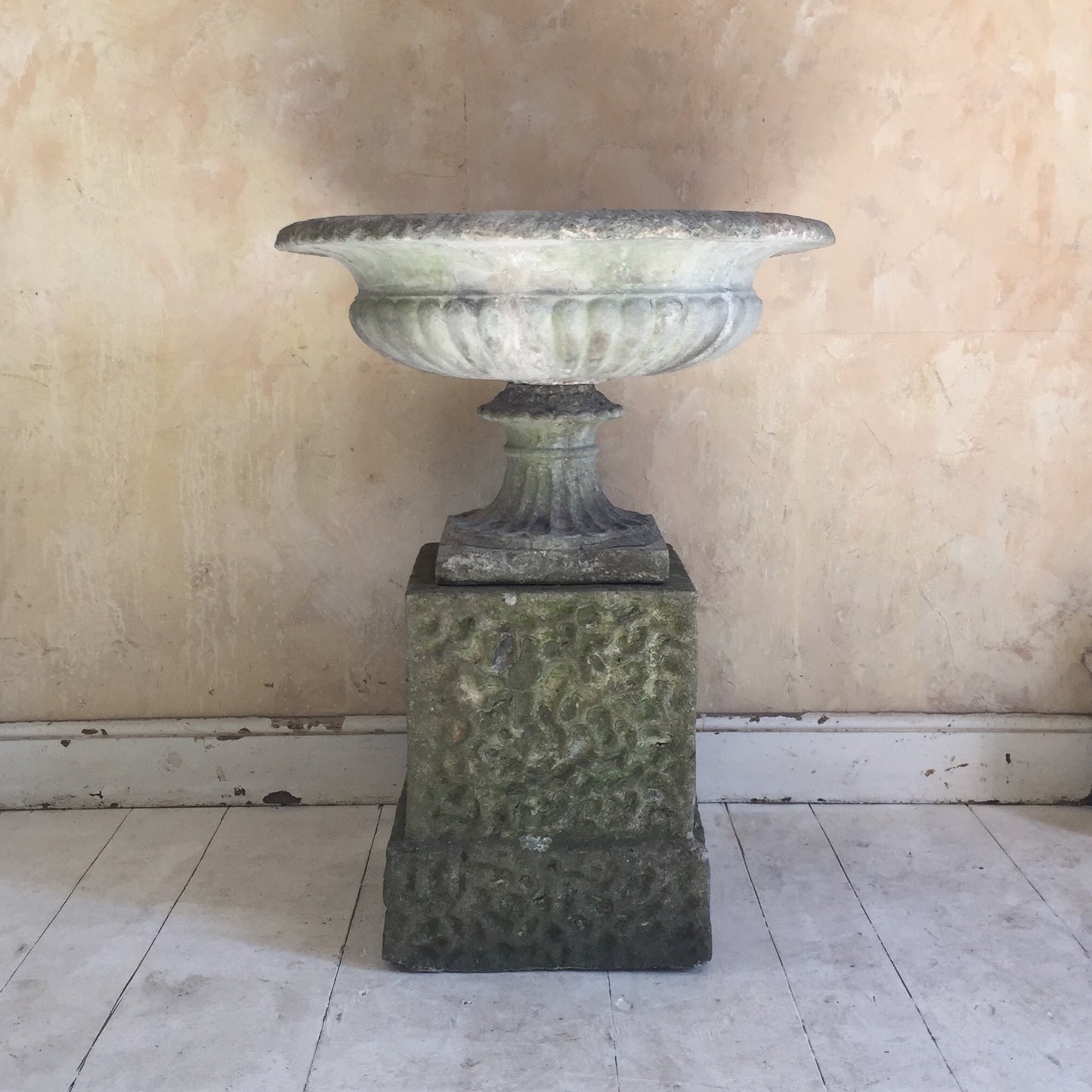 Urn On Rusticated Plinth
