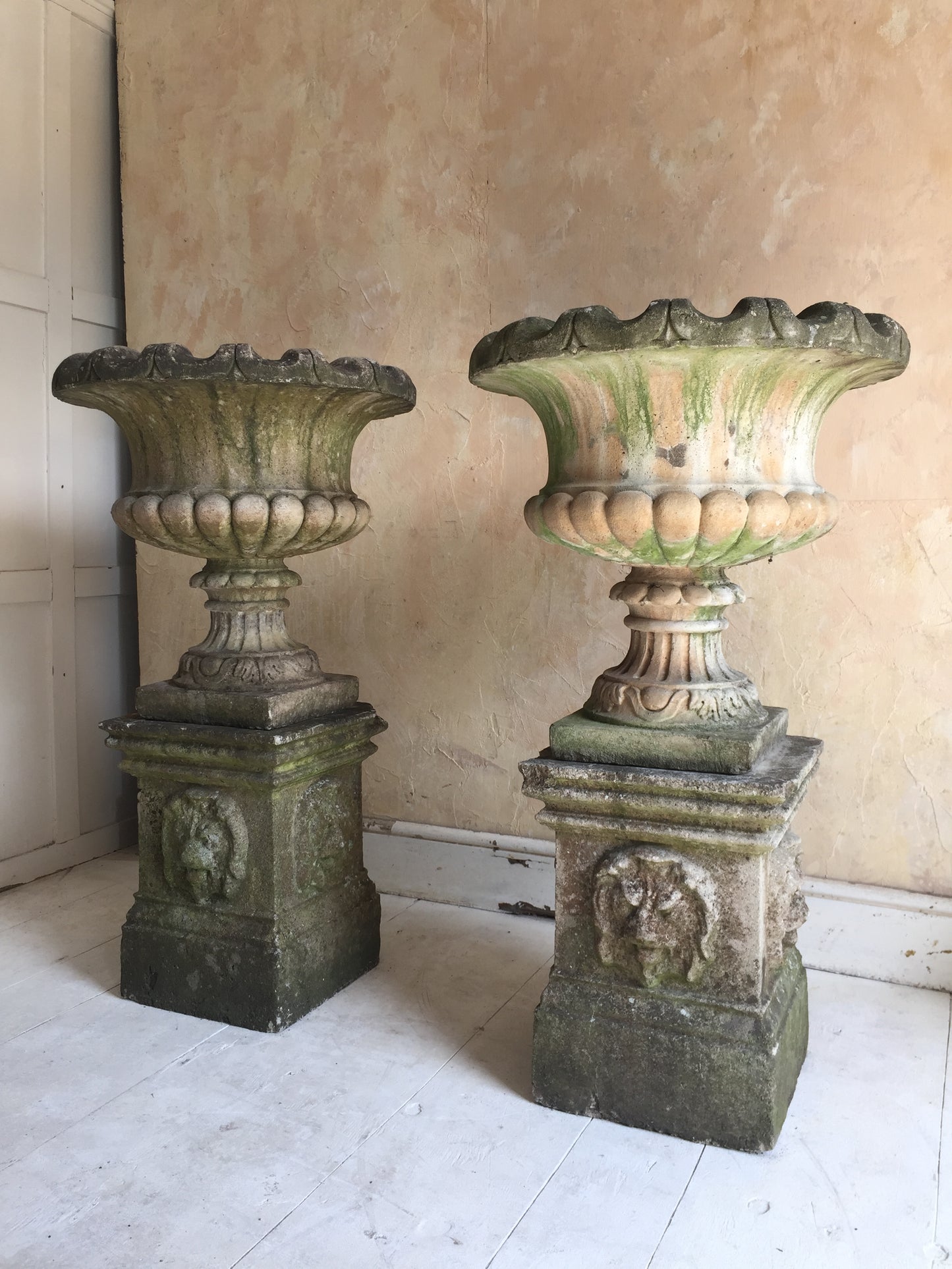 Pair Of Urns On Pedestals