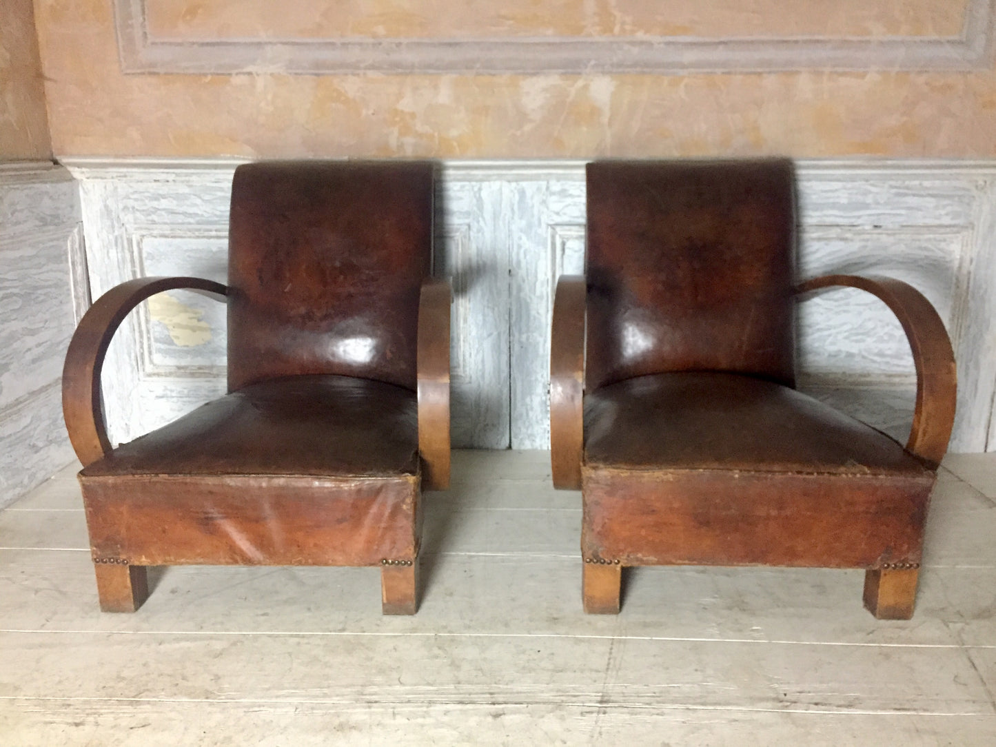 Pair Of Leather Arm Chairs