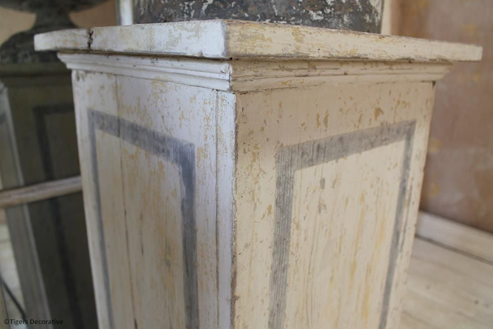A Pair Of Victorian Urns On Plinths