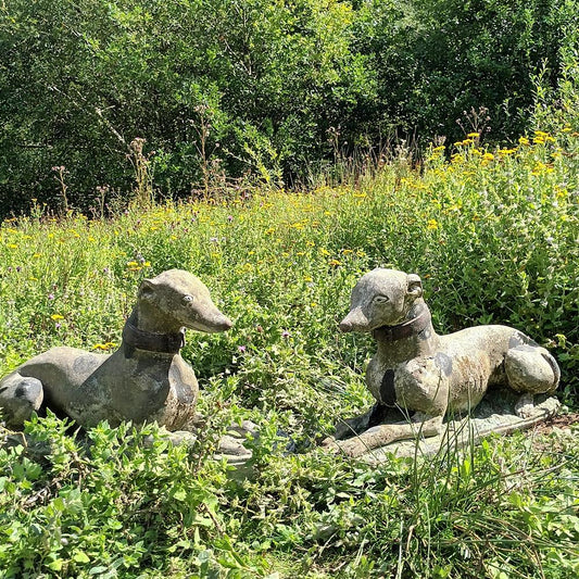 A Pair Of Composite Stone Whippets