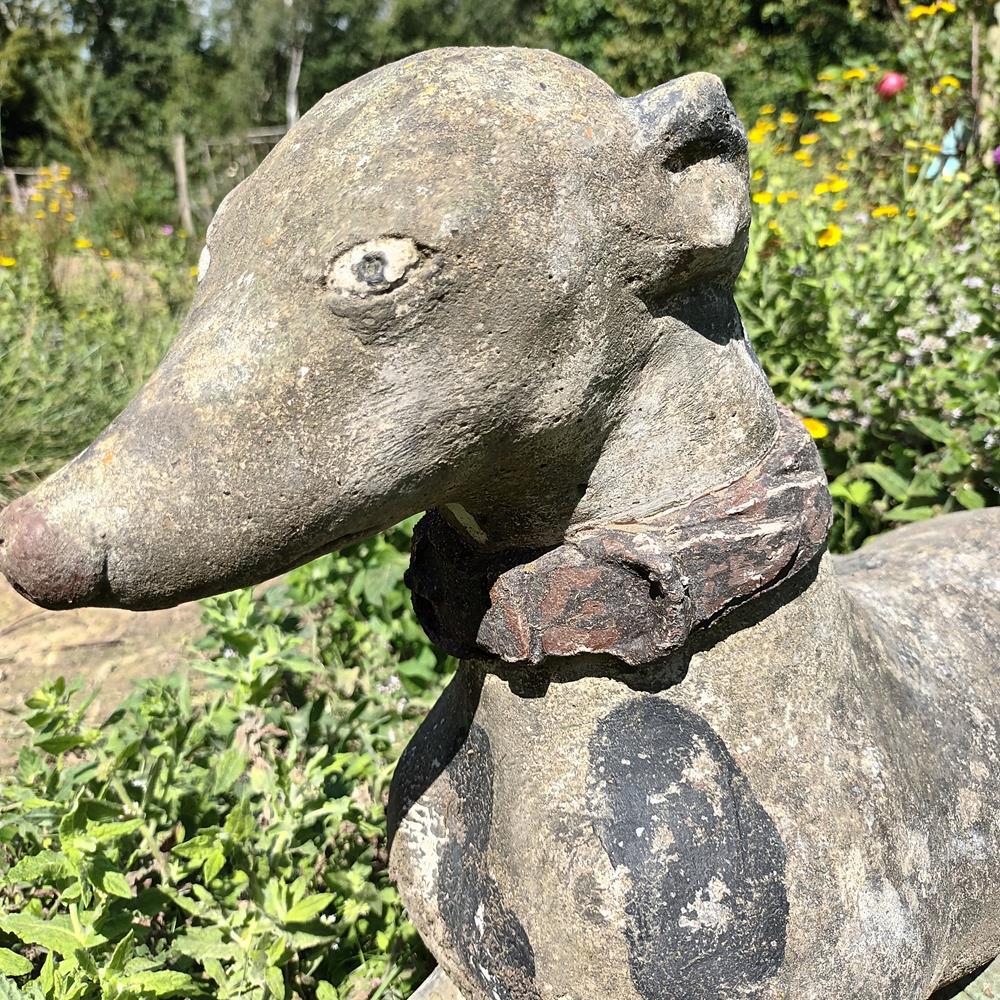 A Pair Of Composite Stone Whippets