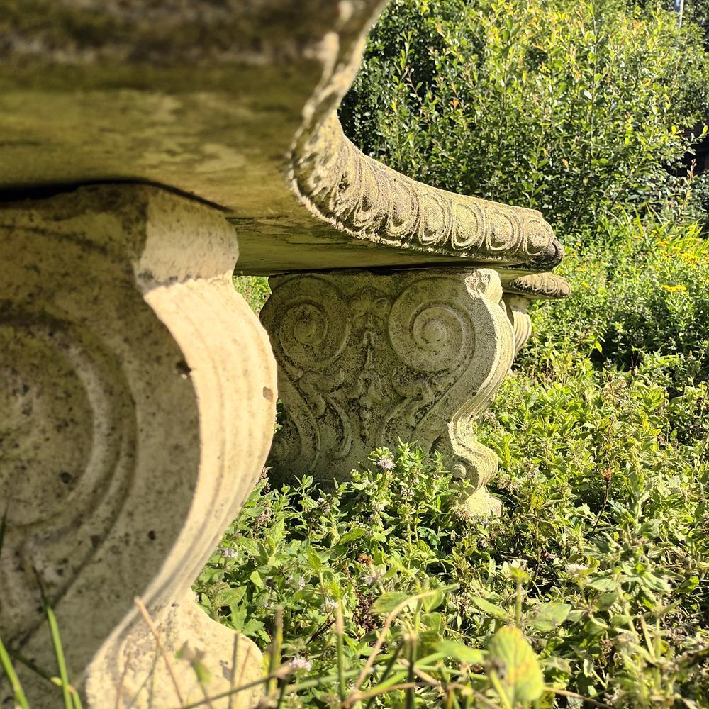 A Pair Of Curved Stone Garden Benches