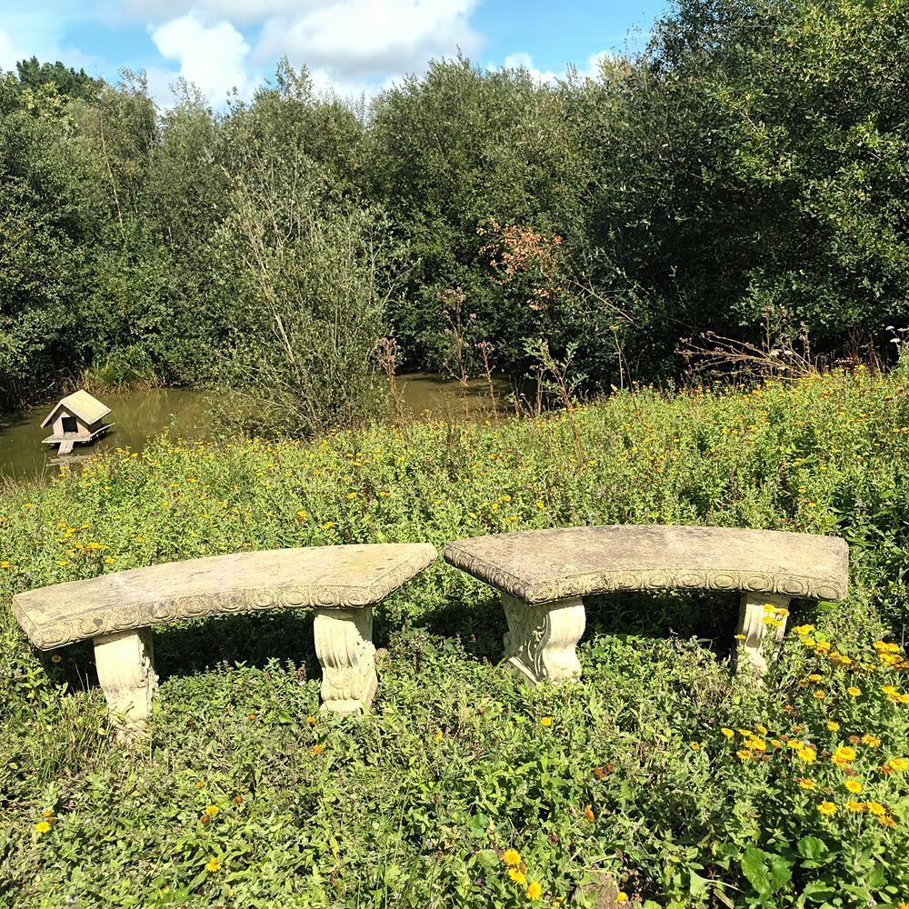 A Pair Of Curved Stone Garden Benches