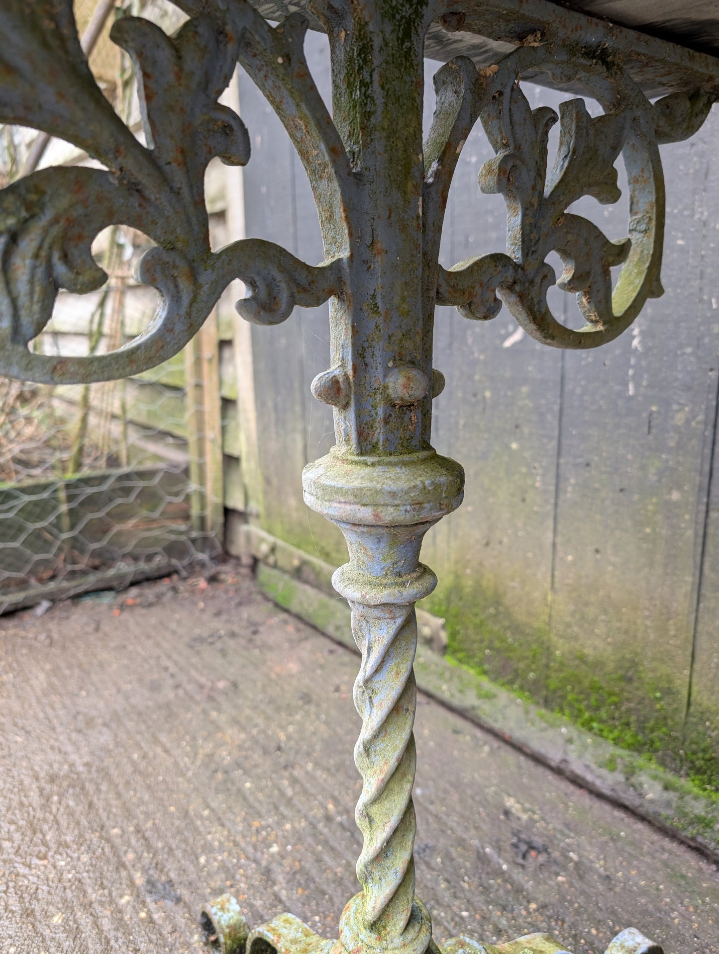A Cast Iron Marble Top Console Table