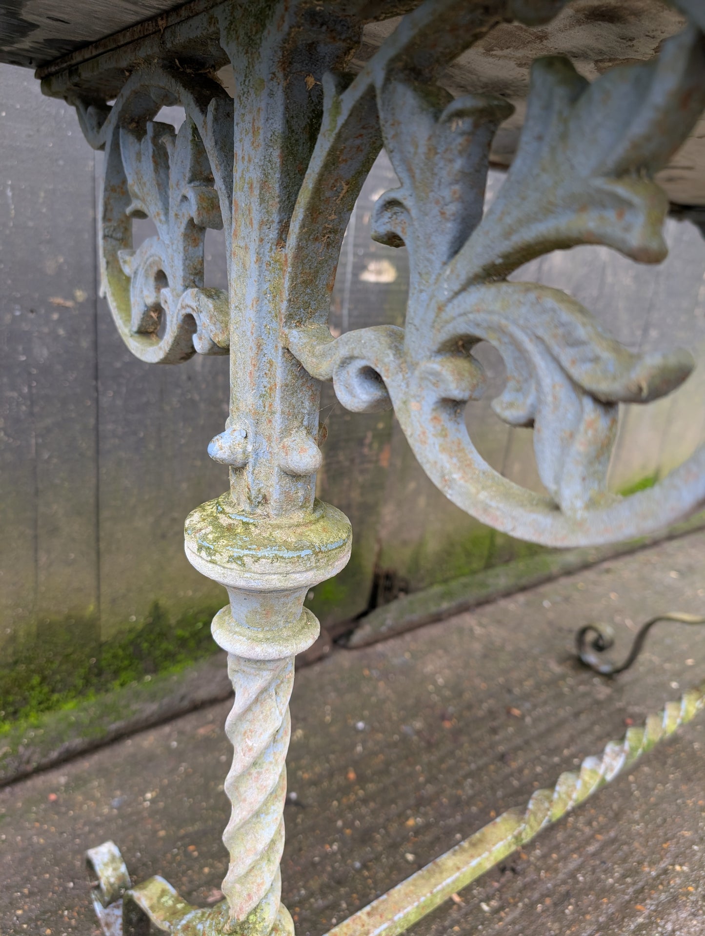 A Cast Iron Marble Top Console Table