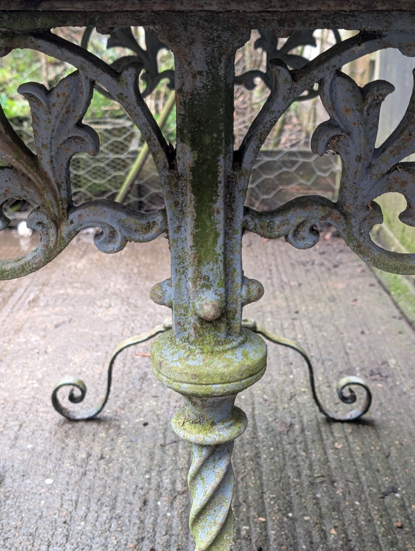 A Cast Iron Marble Top Console Table