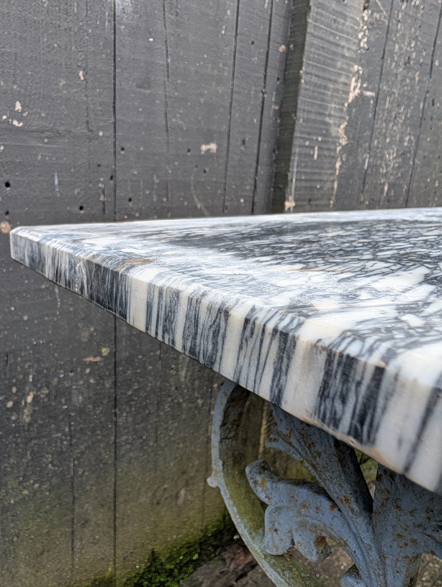 A Cast Iron Marble Top Console Table