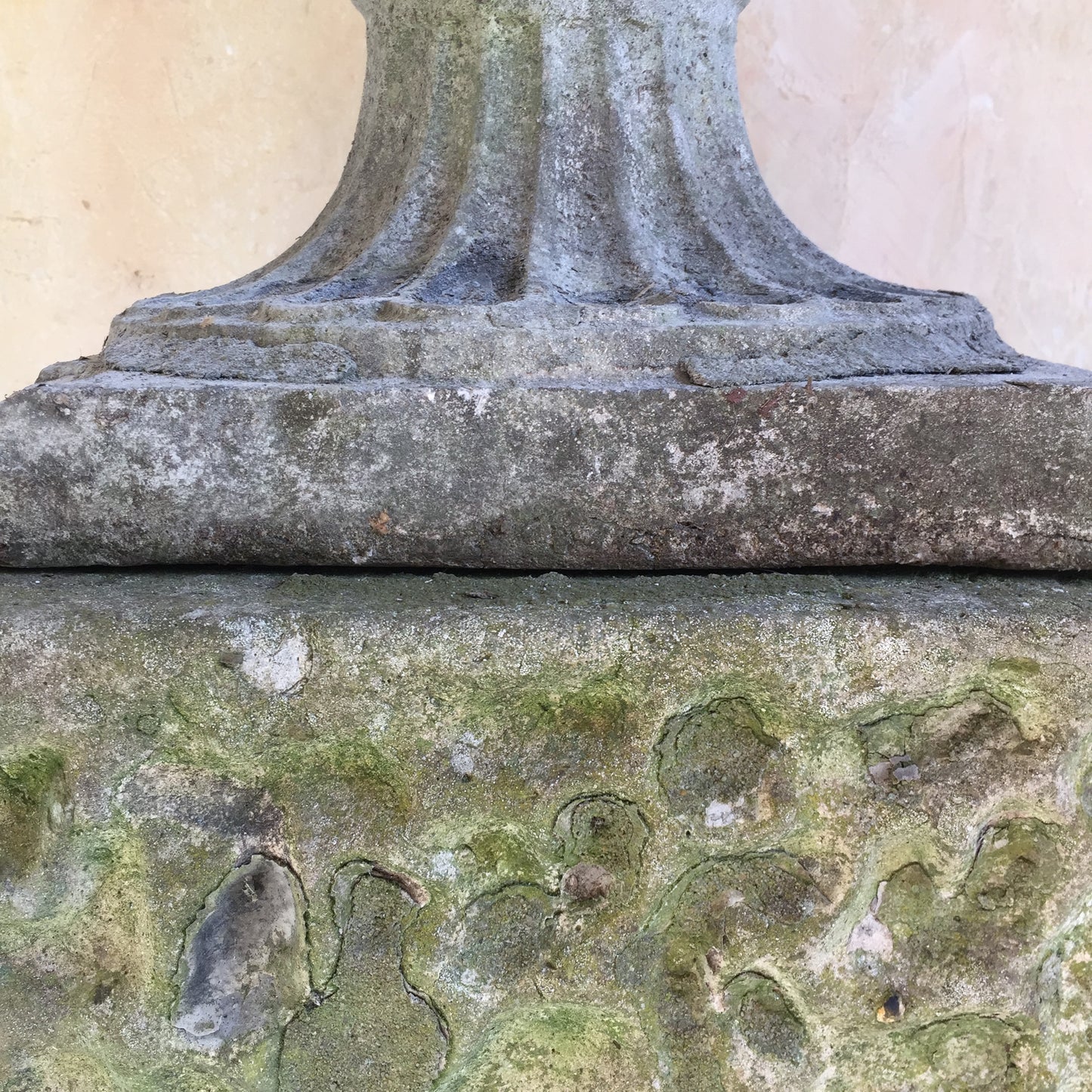 Urn On Rusticated Plinth