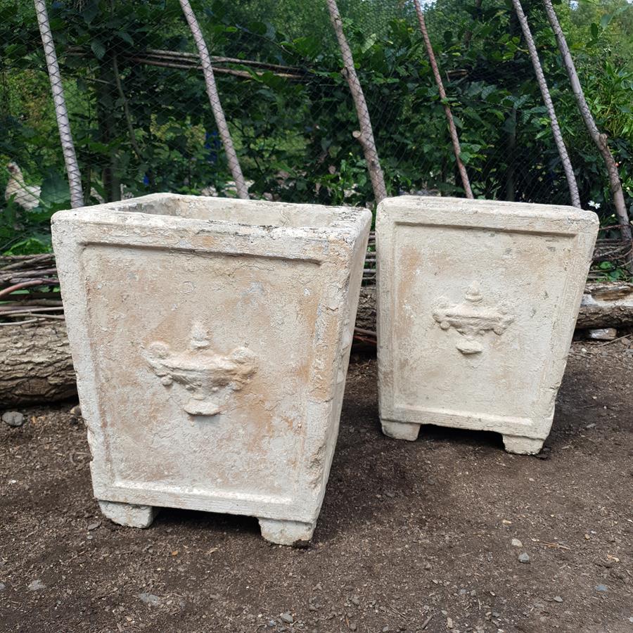 A Pair Of Stone Planters