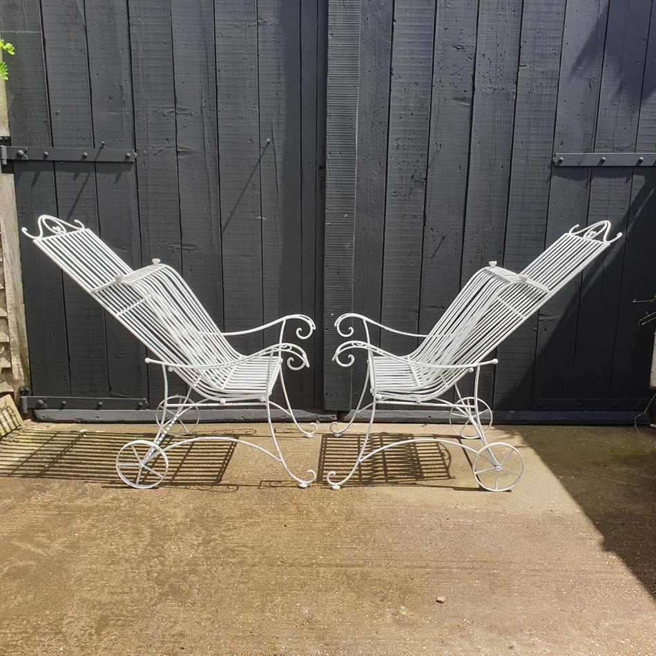 A Pair Of Painted Iron Sun Loungers