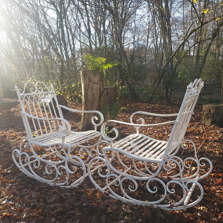 A Pair Of French Iron Rocking Chairs