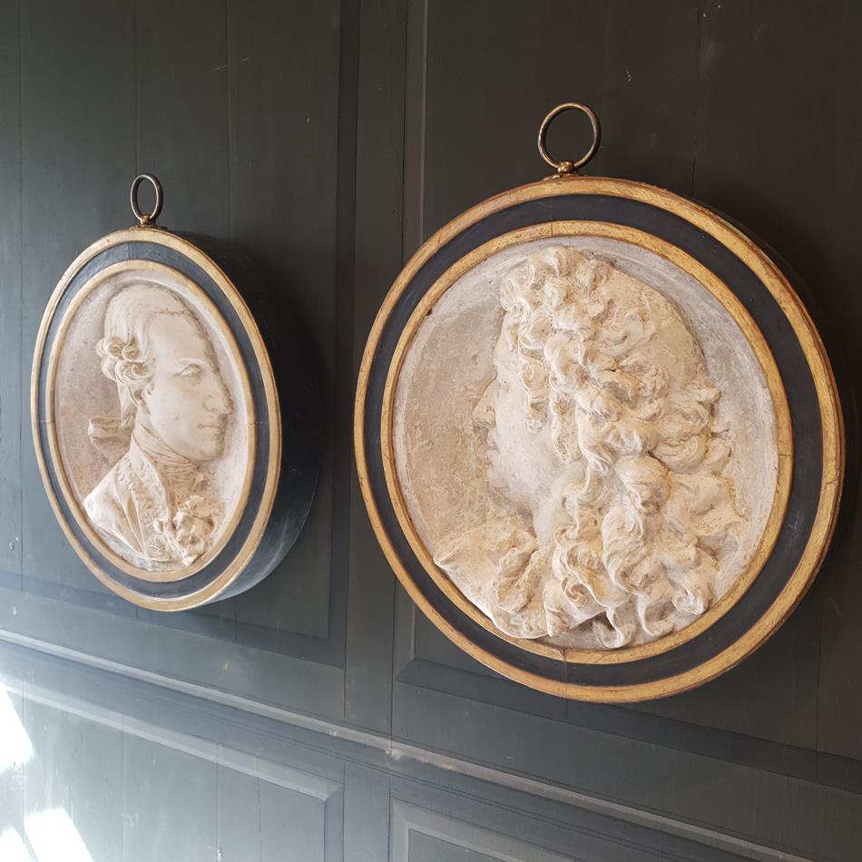 A Pair Of Plaster Roundels