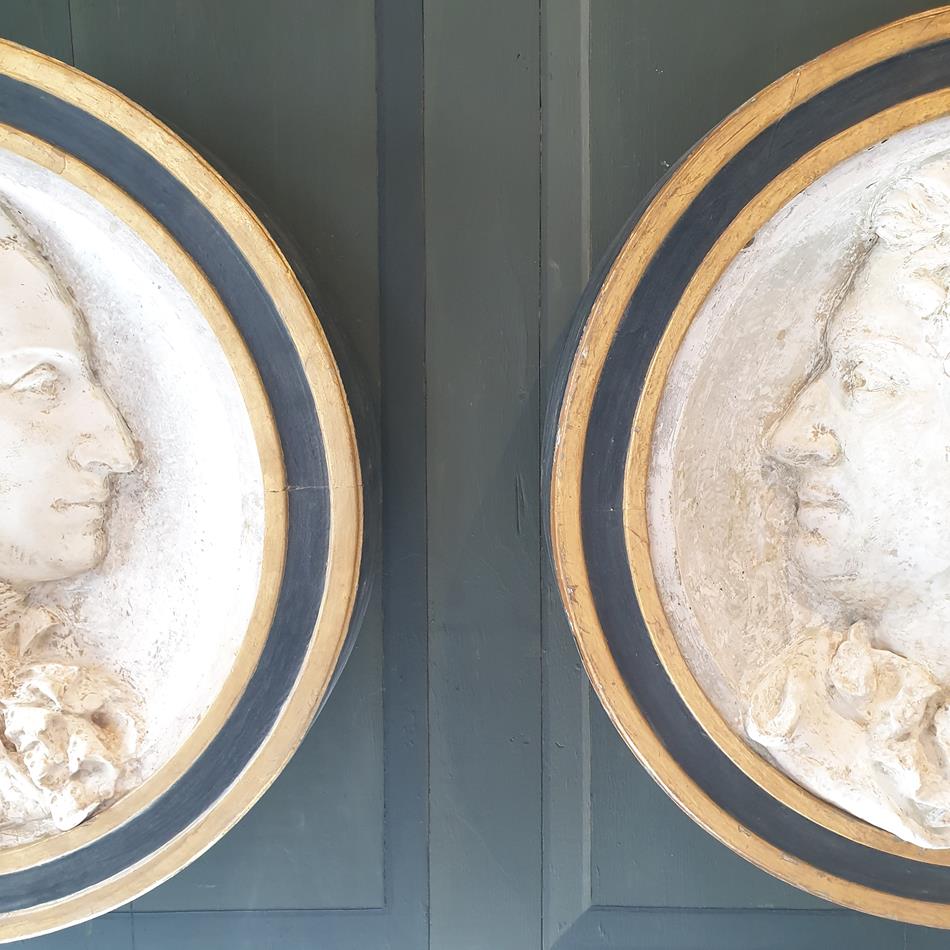 A Pair Of Plaster Roundels