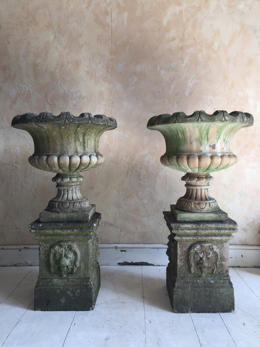 Pair Of Urns On Pedestals