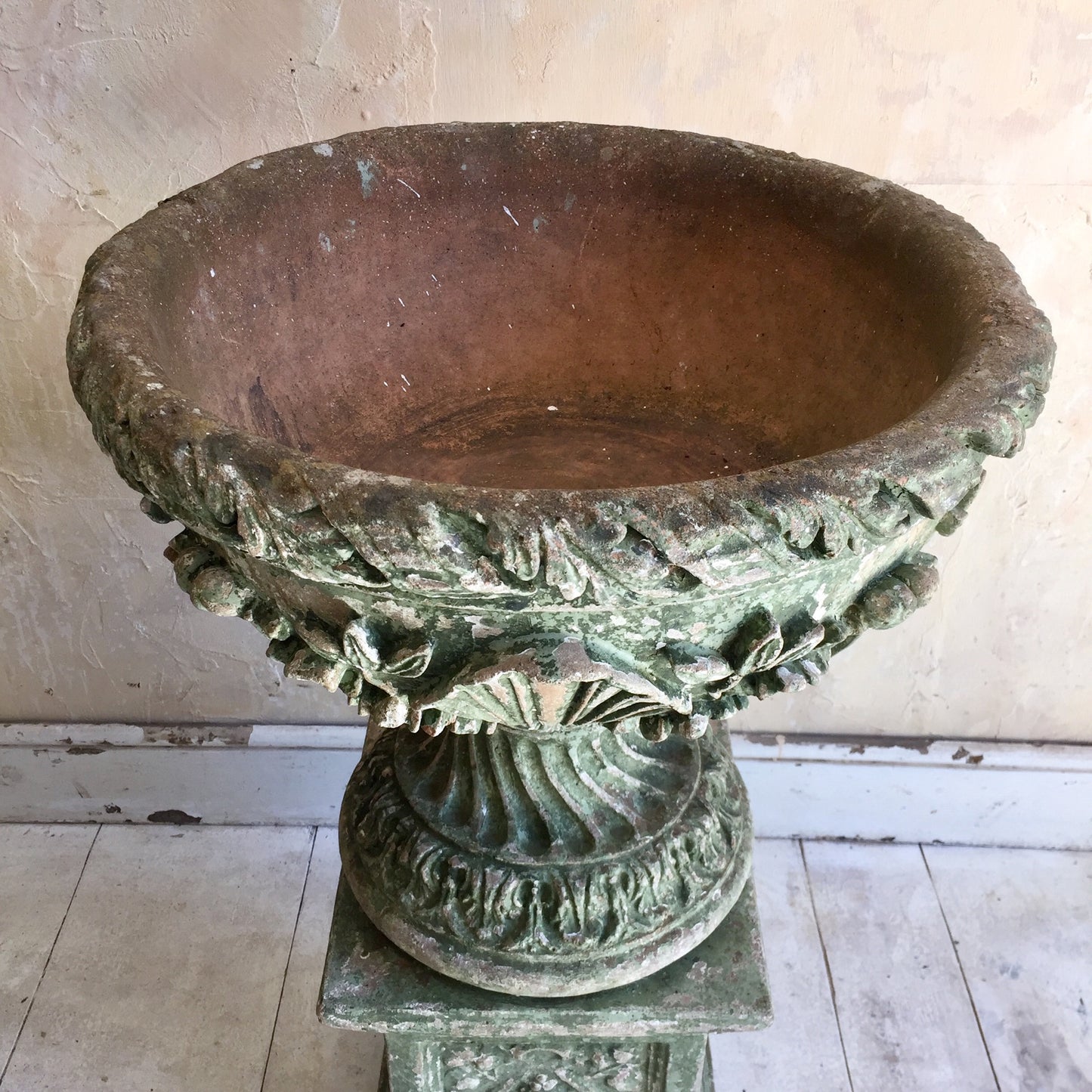 Painted Urn On Plinth