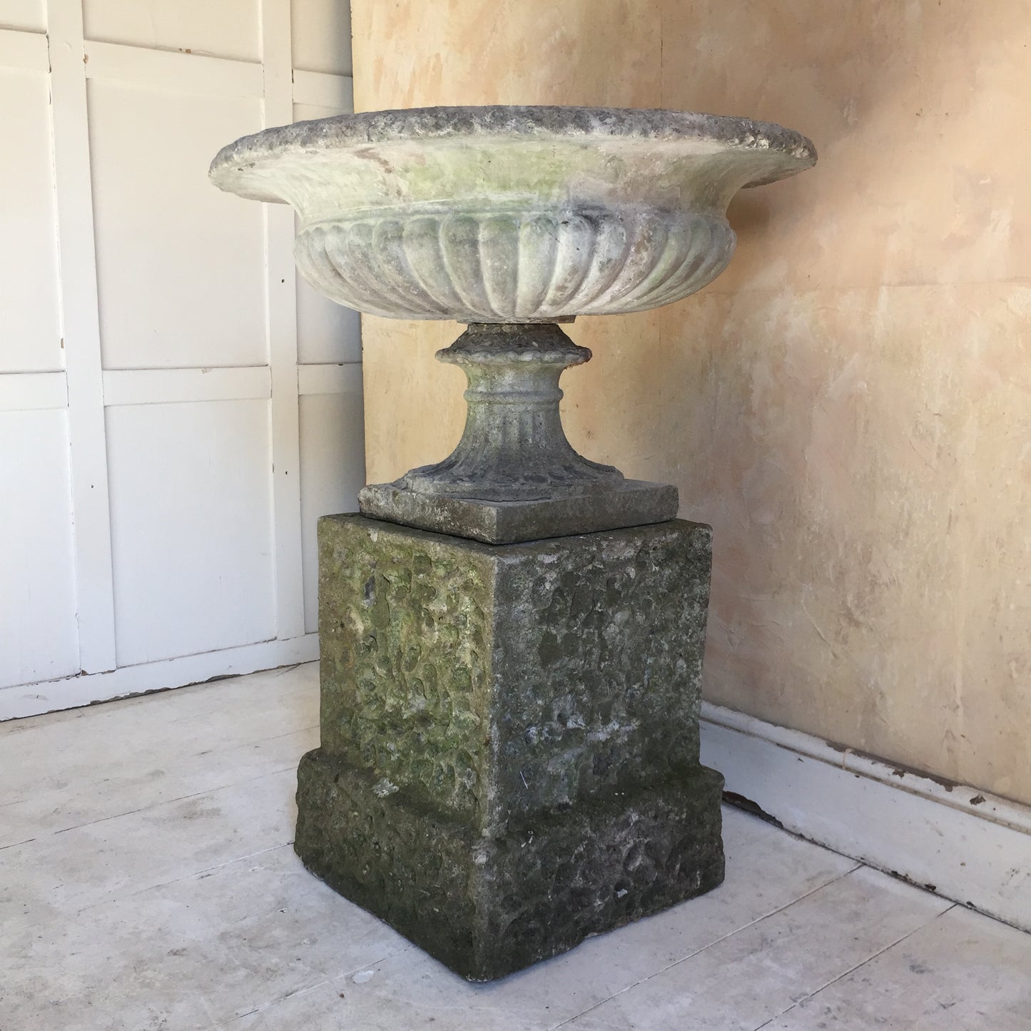 Urn On Rusticated Plinth