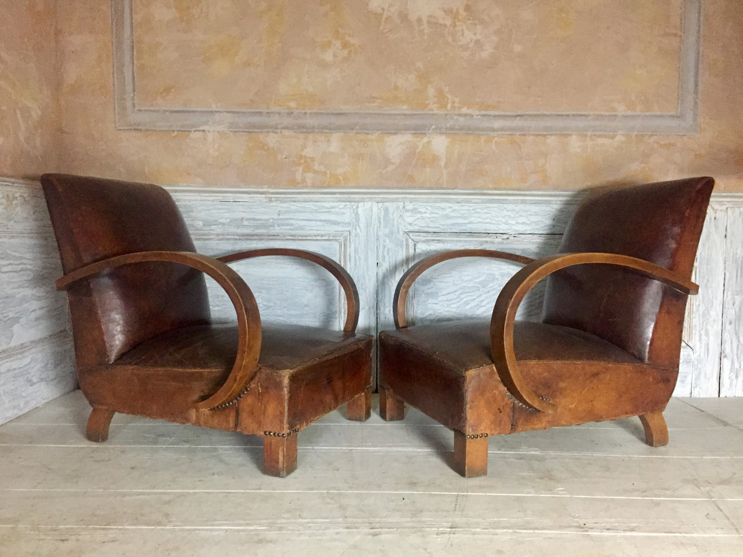 Pair Of Leather Arm Chairs