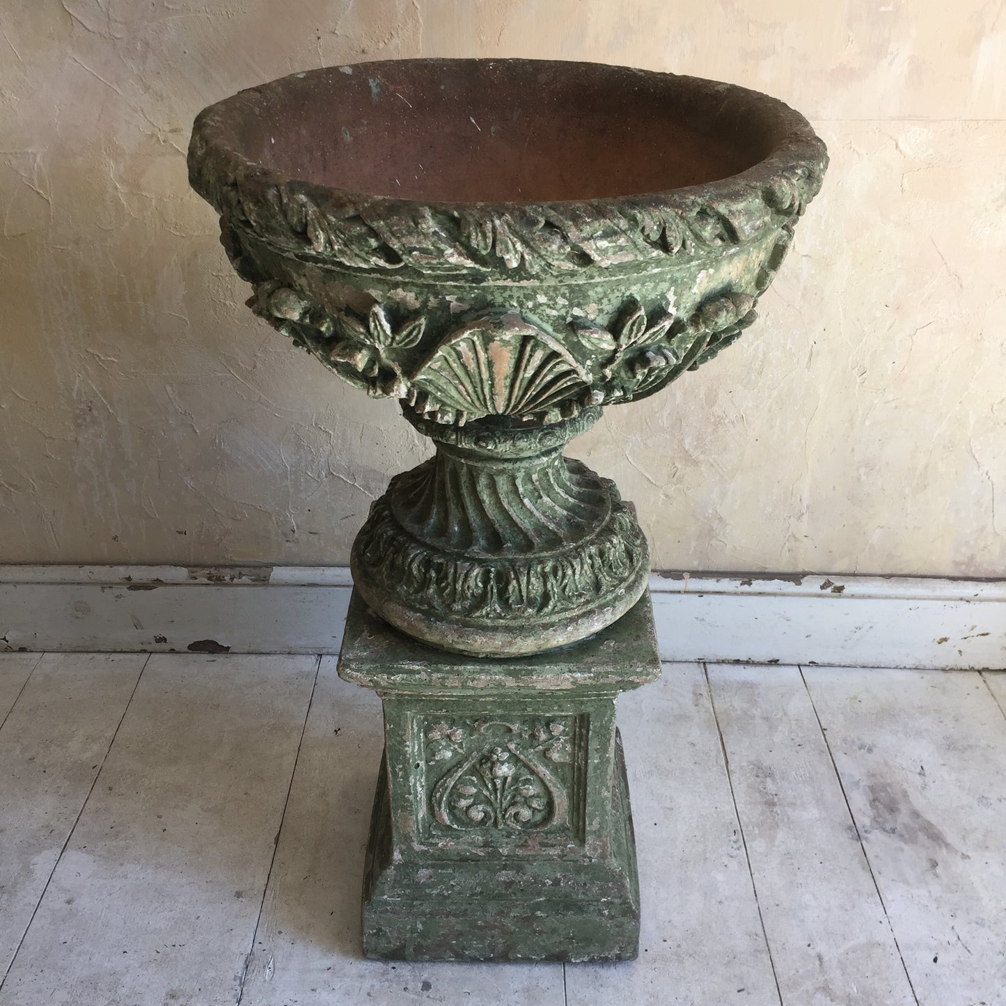 Painted Urn On Plinth