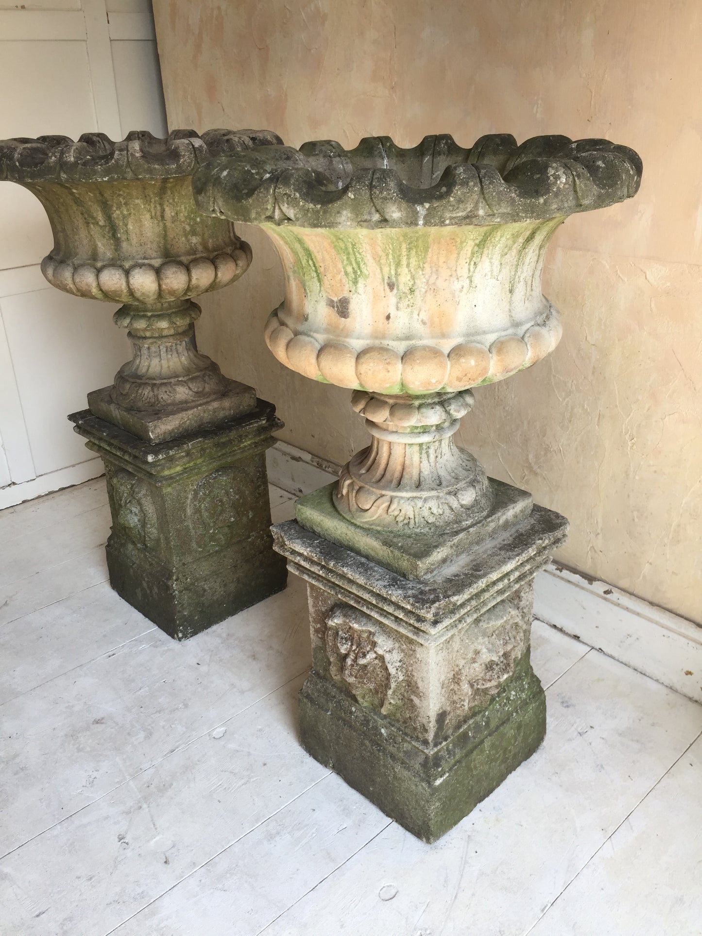 Pair Of Urns On Pedestals