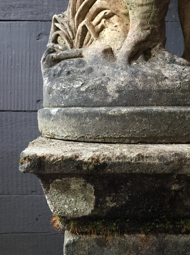 Statue Of Children On Plinth