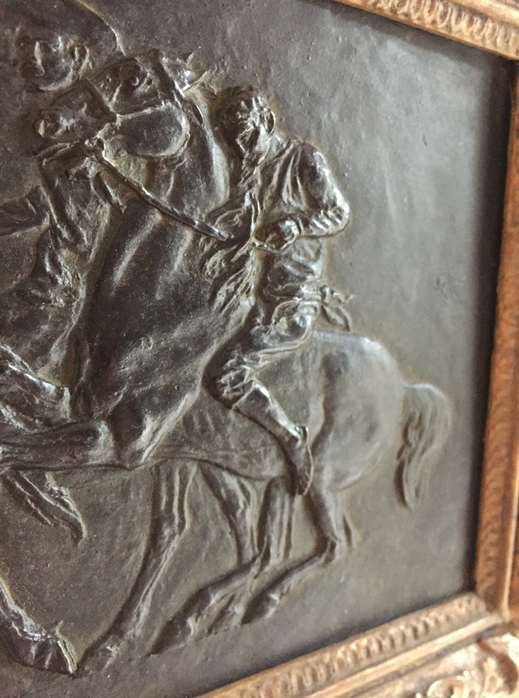 A Signed Bronze Relief