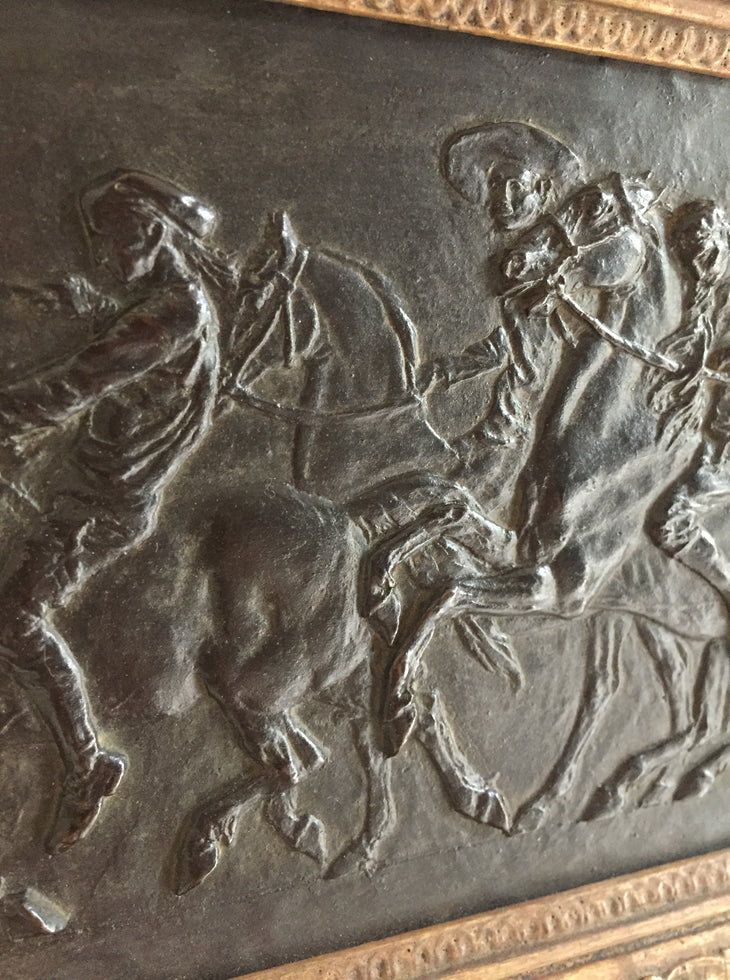 A Signed Bronze Relief