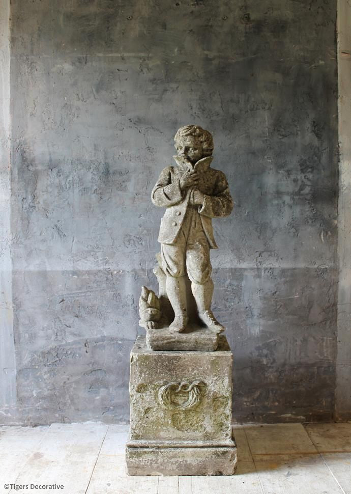 Statue Of A Boy